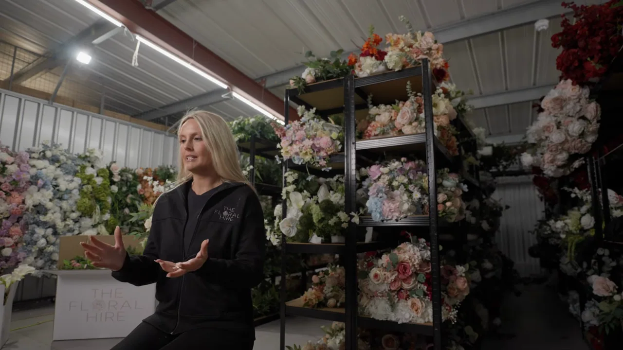 Interview views are interrupted by wider warehouse and doorway shots.